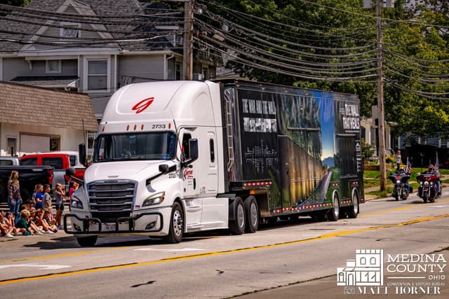 The semi truck carrying The Wall That Heals drives through Wadsworth