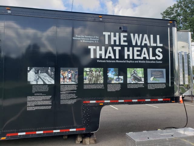 Interpretive panels along the side of the exhibit trailer