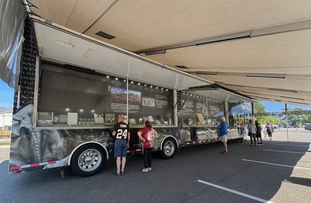 Visitors browse the displays at the Mobile Education Center